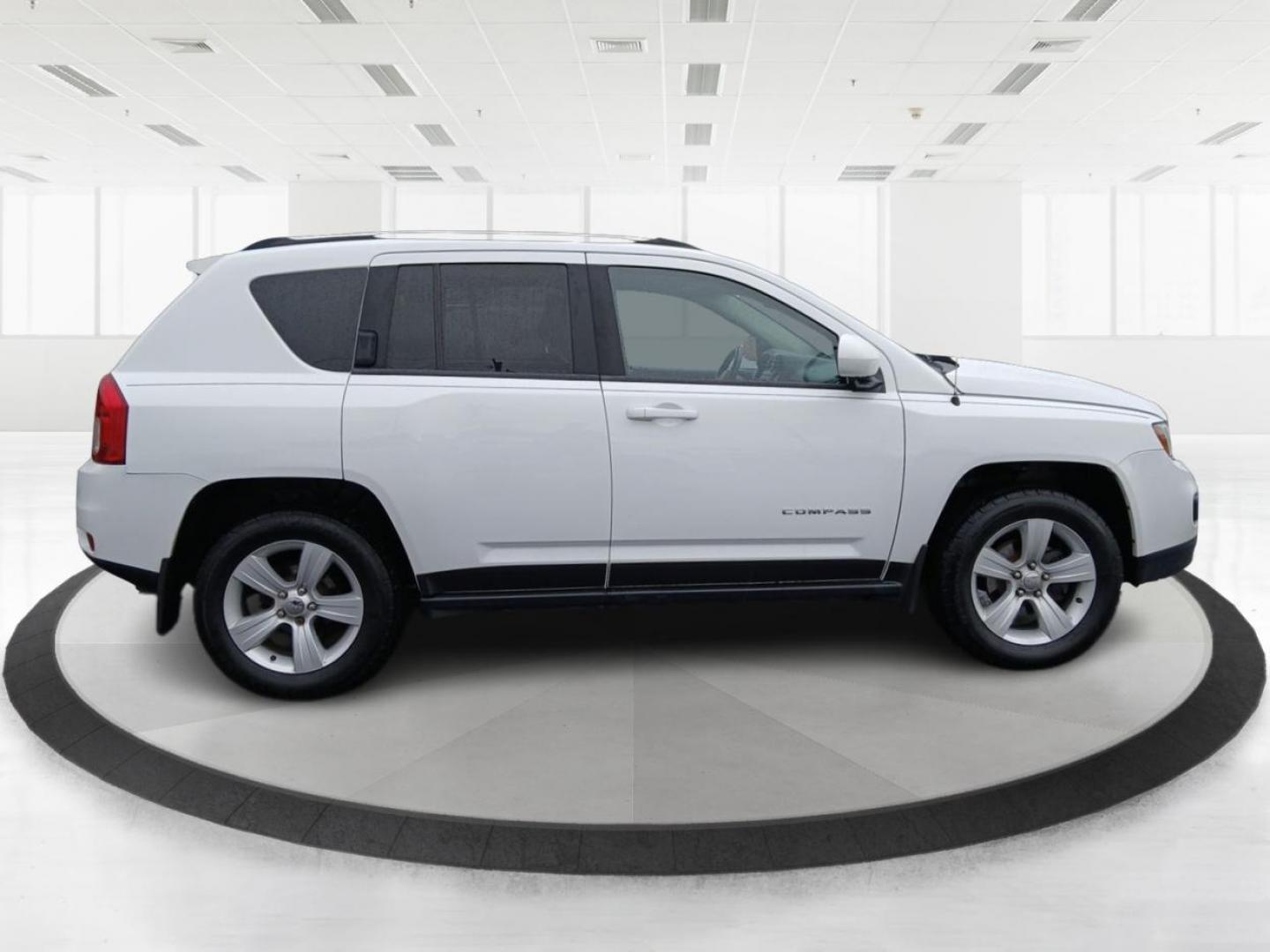 2015 Jeep Compass Latitude 4WD (1C4NJDEB2FD) with an 2.4L L4 DOHC 16V engine, 6-Speed Automatic transmission, located at 1184 Kauffman Ave, Fairborn, OH, 45324, (937) 908-9800, 39.807072, -84.031563 - Photo#1