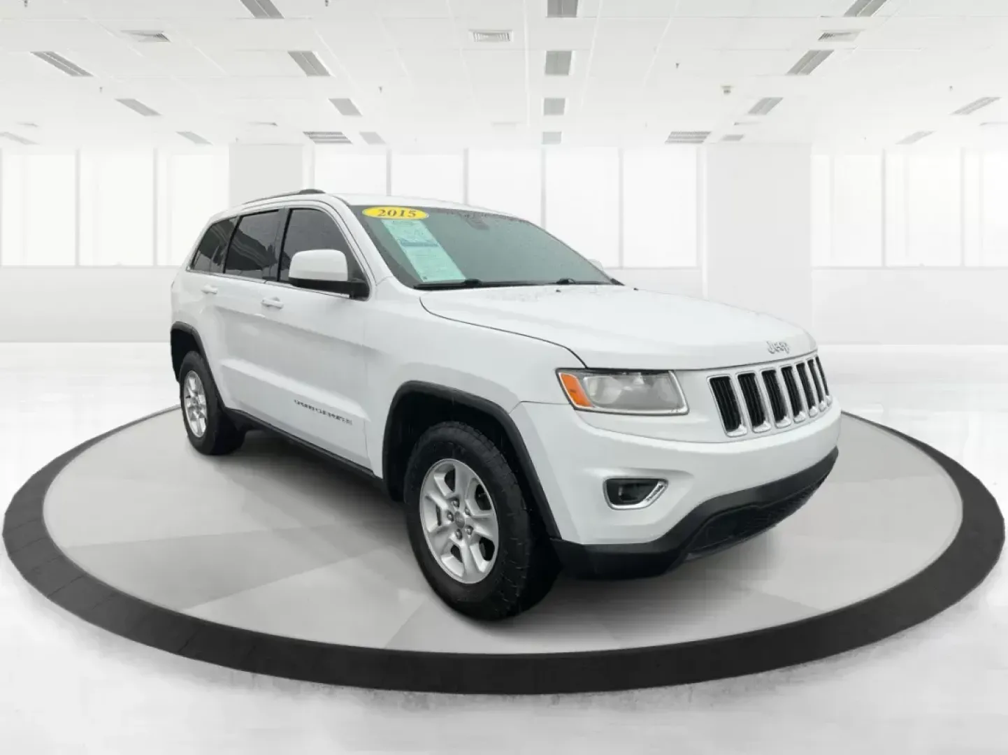 2015 Jeep Grand Cherokee Laredo (1C4RJFAG7FC) with an 3.6L V-6 DOHC engine, located at 8750 N County Rd 25A, Piqua, OH, 45356, (937) 908-9800, 40.164391, -84.232513 - Photo#0