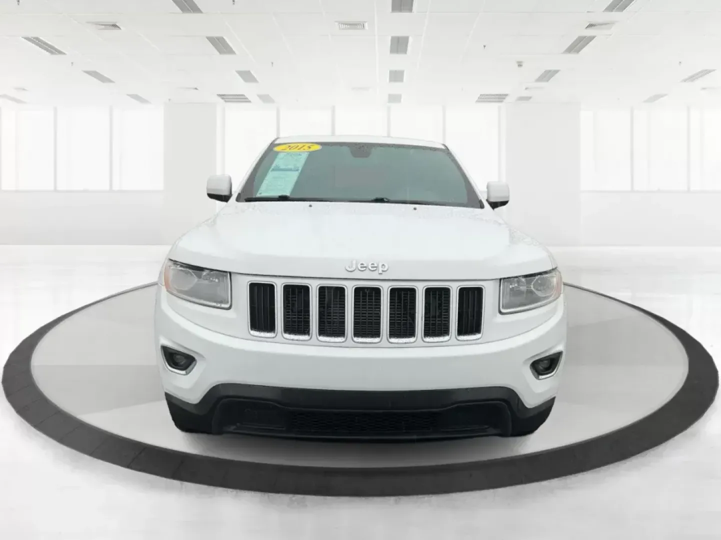 2015 Jeep Grand Cherokee Laredo (1C4RJFAG7FC) with an 3.6L V-6 DOHC engine, located at 8750 N County Rd 25A, Piqua, OH, 45356, (937) 908-9800, 40.164391, -84.232513 - Photo#6