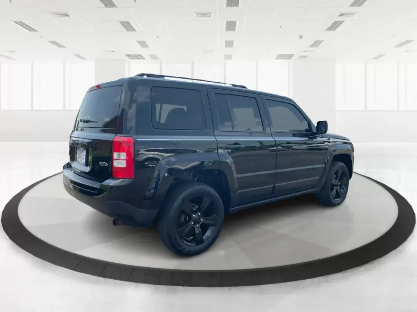 2015 Jeep Patriot Altitude Edition (1C4NJRBB1FD) with an 2.4L I-4 DOHC engine, located at 1951 S Dayton Lakeview Rd., New Carlisle, OH, 45344, (937) 908-9800, 39.890999, -84.050255 - Photo#2
