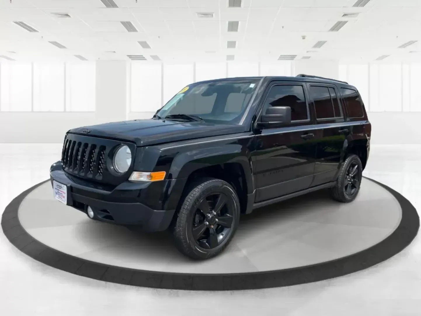 2015 Jeep Patriot Altitude Edition (1C4NJRBB1FD) with an 2.4L I-4 DOHC engine, located at 1951 S Dayton Lakeview Rd., New Carlisle, OH, 45344, (937) 908-9800, 39.890999, -84.050255 - Photo#7