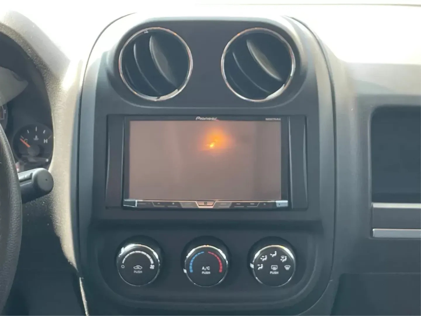 2015 Jeep Patriot Altitude Edition (1C4NJRBB1FD) with an 2.4L I-4 DOHC engine, located at 1951 S Dayton Lakeview Rd., New Carlisle, OH, 45344, (937) 908-9800, 39.890999, -84.050255 - Photo#12