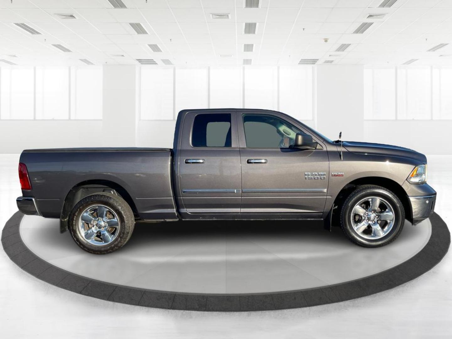 2015 Ram 1500 SLT Quad Cab 4WD (1C6RR7GT2FS) with an 5.7L V8 OHV 16V engine, 8-Speed Automatic transmission, located at 1951 S Dayton Lakeview Rd., New Carlisle, OH, 45344, (937) 908-9800, 39.890999, -84.050255 - Photo#1