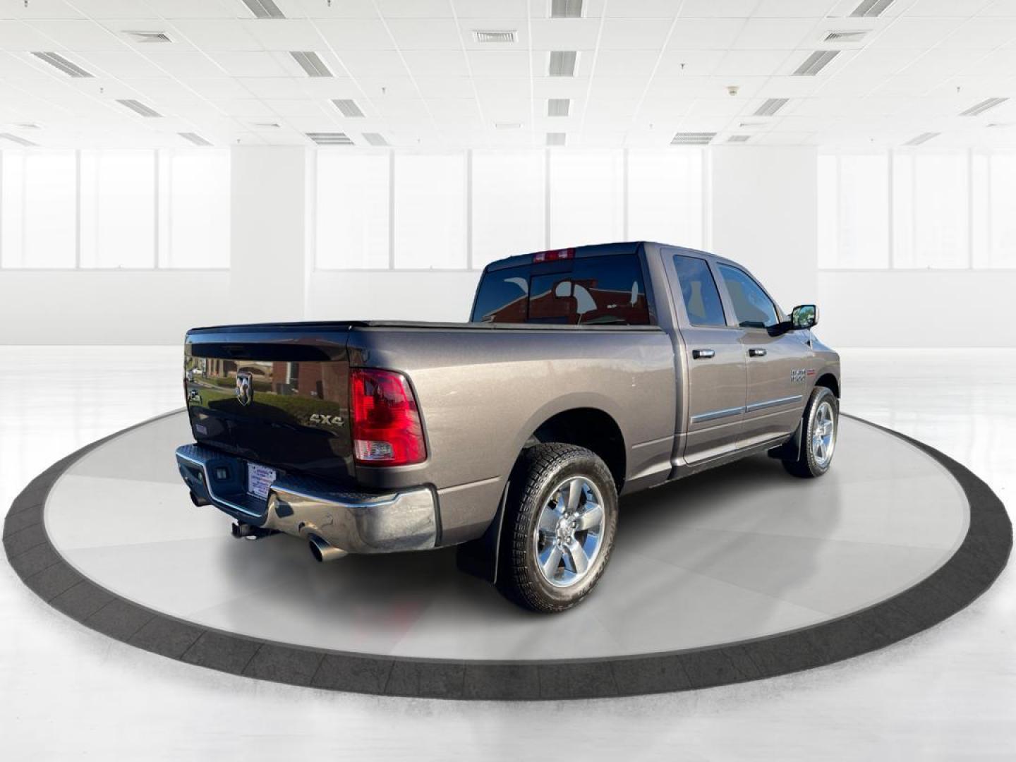 2015 Ram 1500 SLT Quad Cab 4WD (1C6RR7GT2FS) with an 5.7L V8 OHV 16V engine, 8-Speed Automatic transmission, located at 1951 S Dayton Lakeview Rd., New Carlisle, OH, 45344, (937) 908-9800, 39.890999, -84.050255 - Photo#2