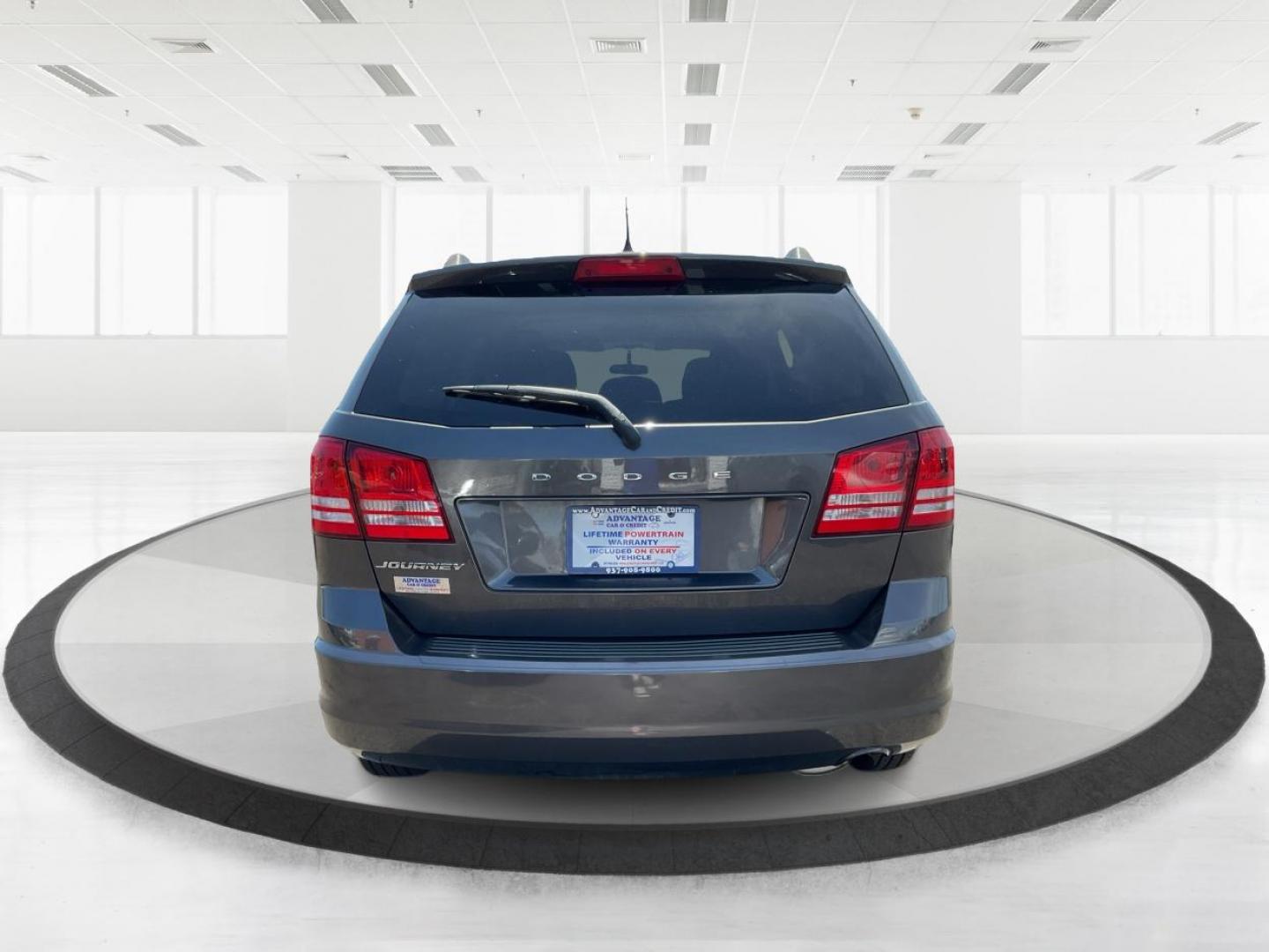 2016 Dodge Journey SE (3C4PDCAB7GT) with an 2.4L L4 DOHC 16V engine, 4-Speed Automatic transmission, located at 1184 Kauffman Ave, Fairborn, OH, 45324, (937) 908-9800, 39.807072, -84.031563 - Photo#4