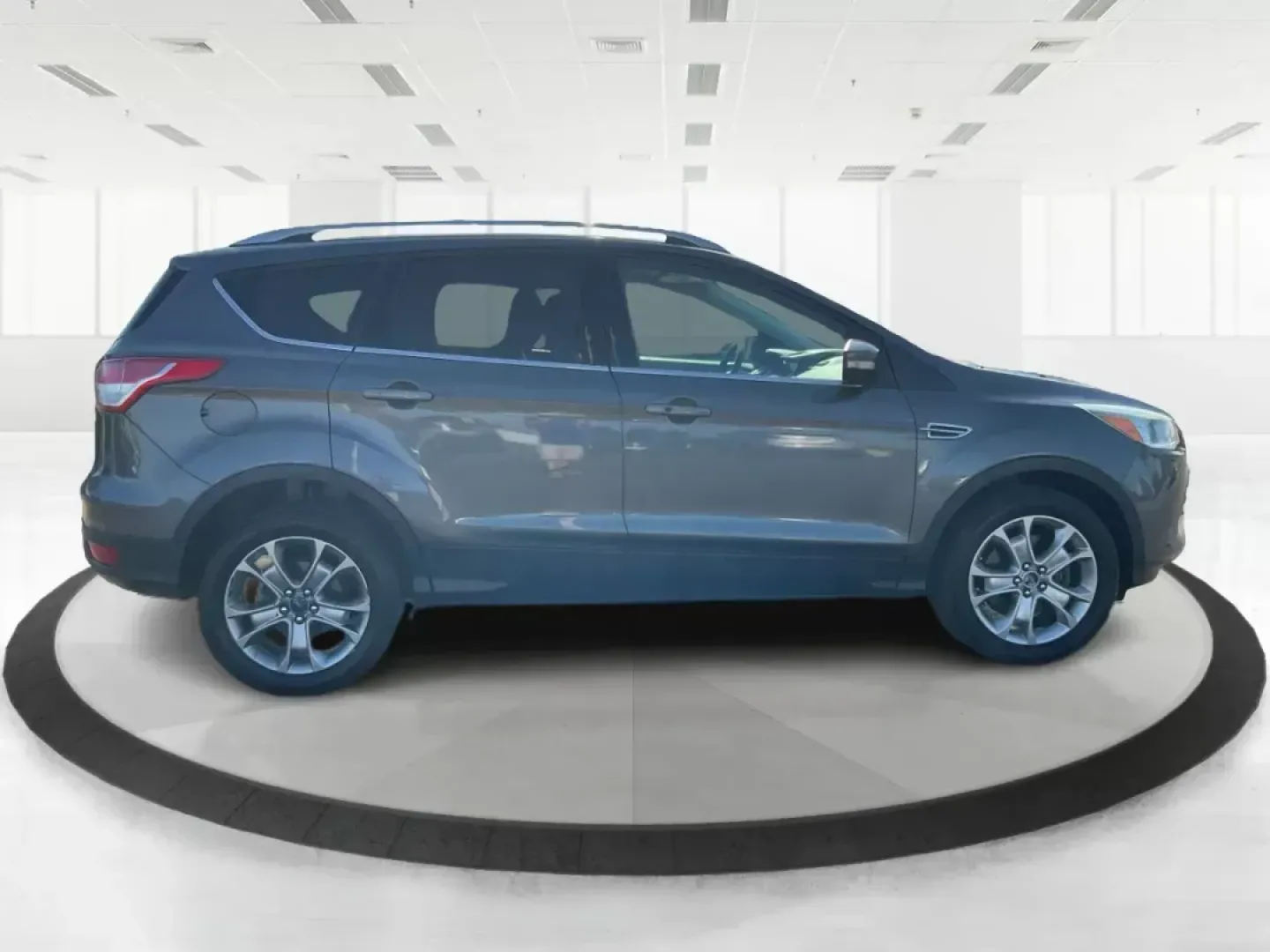 2016 Ford Escape Titanium (1FMCU9J92GU) with an EcoBoost 1.6L I-4 gasoline direct injection engine, located at 4508 South Dixie Dr, Moraine, OH, 45439, (937) 908-9800, 39.807072, -84.031563 - Photo#0