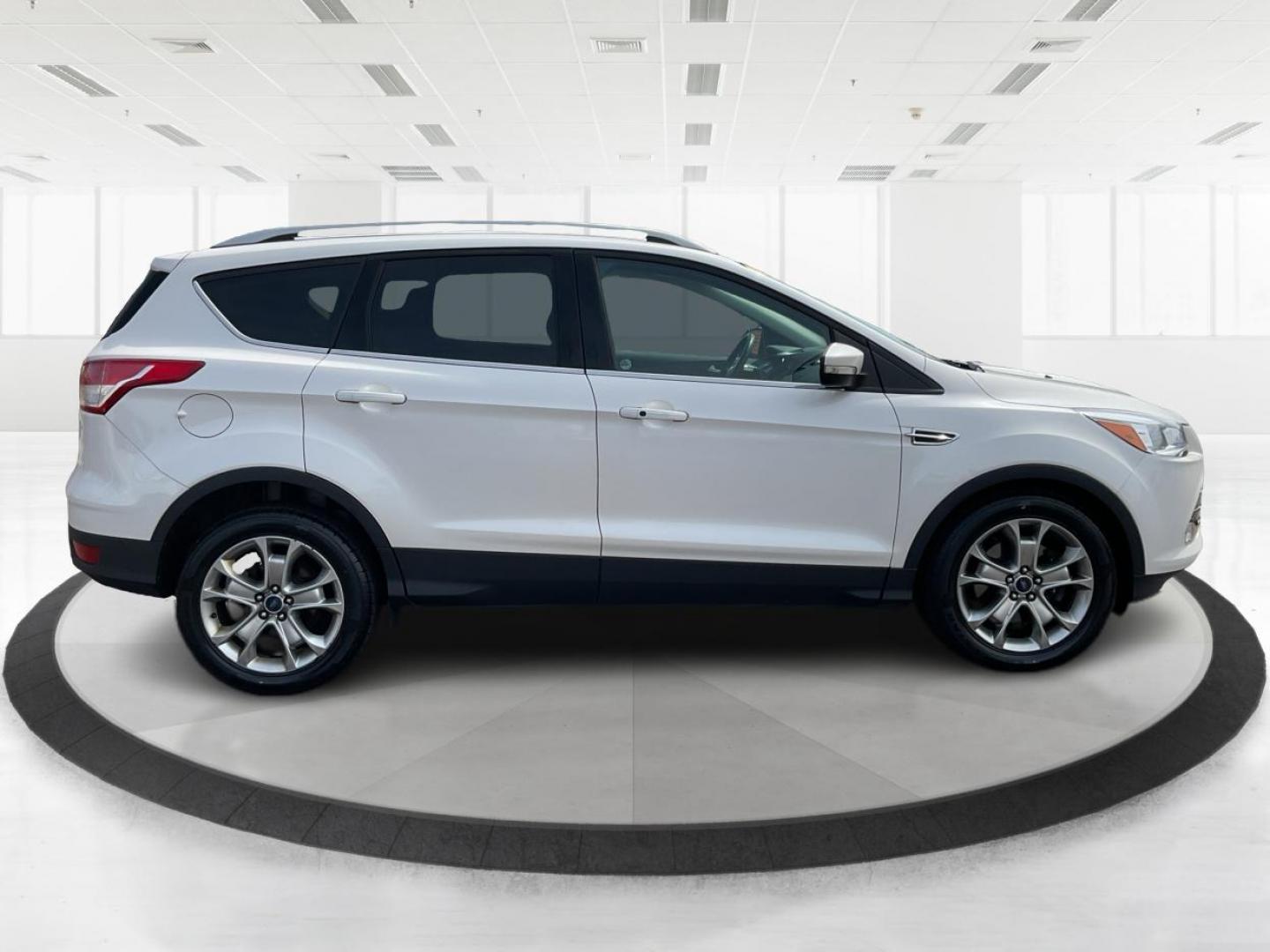 2016 Ford Escape Titanium (1FMCU9J98GU) with an Other engine, located at 880 E. National Road, OH, 45377, (937) 908-9800, 39.891918, -84.183975 - Photo#1