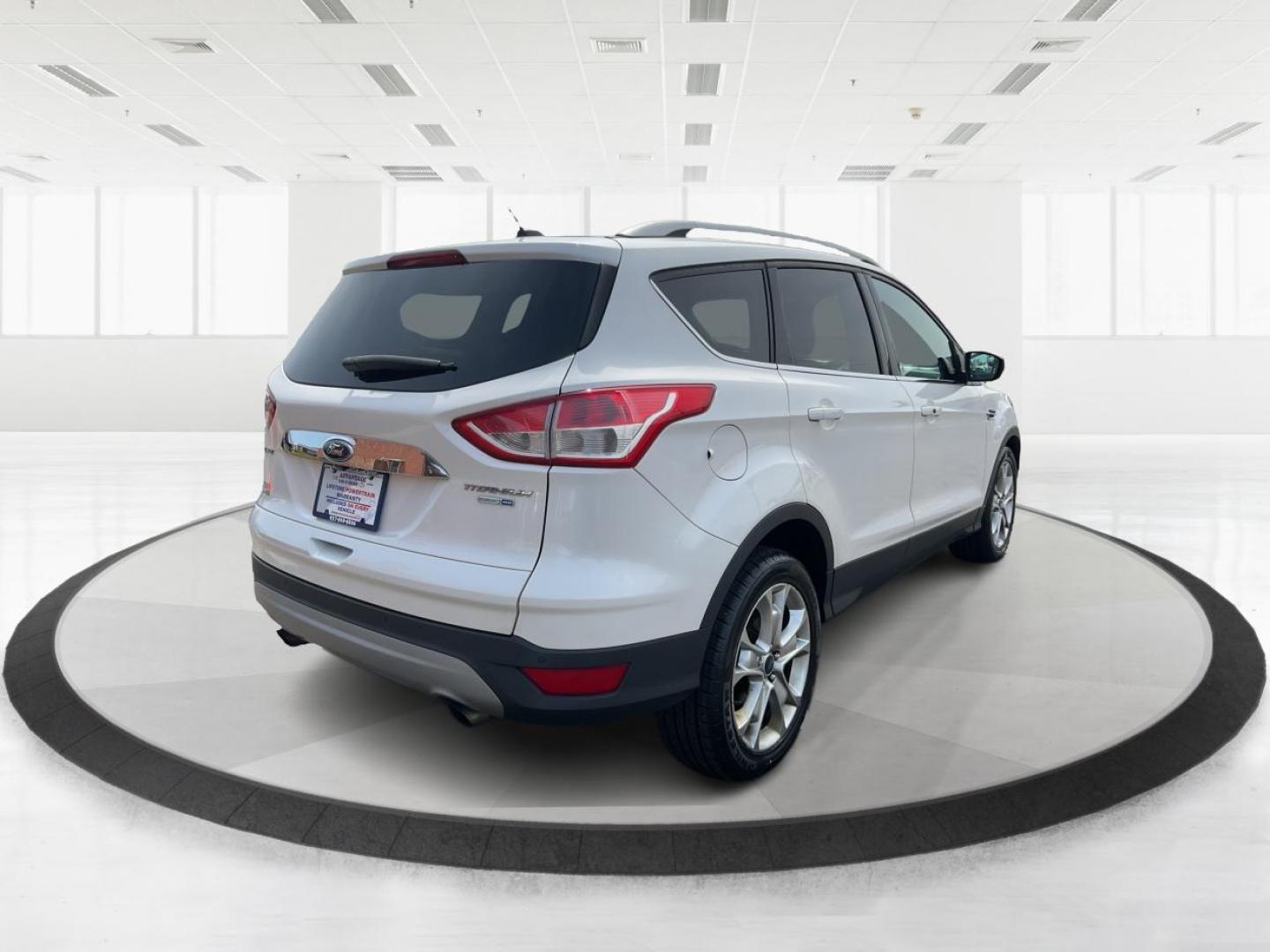 2016 Ford Escape Titanium (1FMCU9J98GU) with an Other engine, located at 880 E. National Road, OH, 45377, (937) 908-9800, 39.891918, -84.183975 - Photo#2
