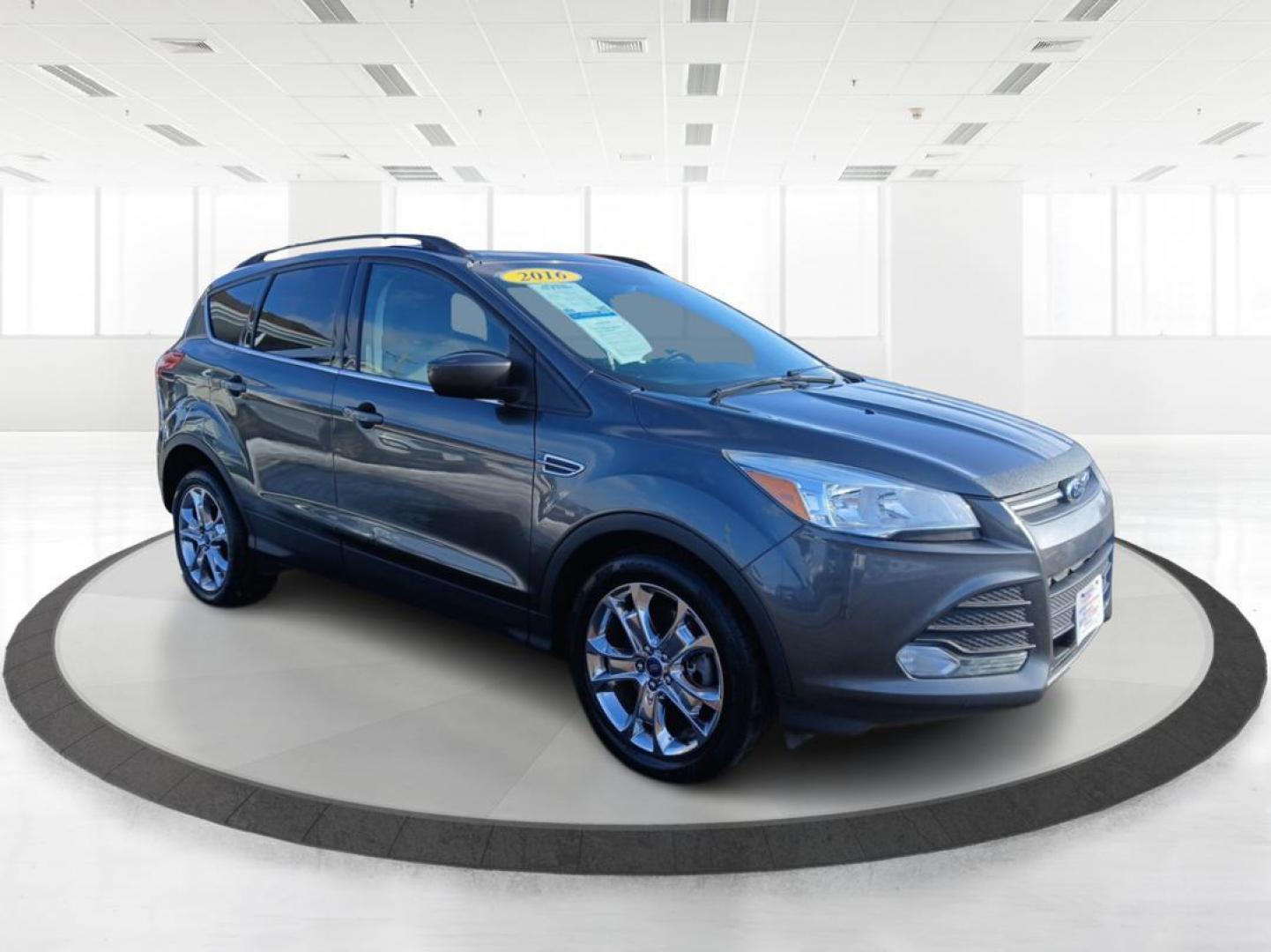 2016 Ford Escape SE 4WD (1FMCU9G91GU) with an 2.0L L4 DOHC 16V engine, 6-Speed Automatic transmission, located at 1184 Kauffman Ave, Fairborn, OH, 45324, (937) 908-9800, 39.807072, -84.031563 - Photo#0