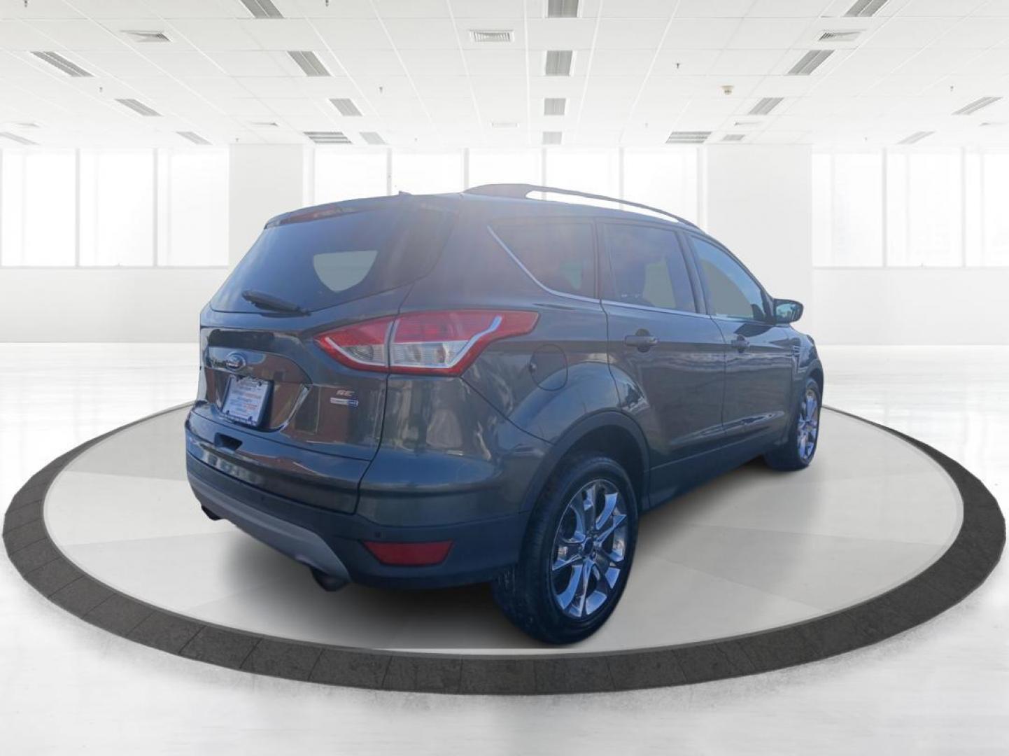 2016 Ford Escape SE 4WD (1FMCU9G91GU) with an 2.0L L4 DOHC 16V engine, 6-Speed Automatic transmission, located at 1184 Kauffman Ave, Fairborn, OH, 45324, (937) 908-9800, 39.807072, -84.031563 - Photo#2