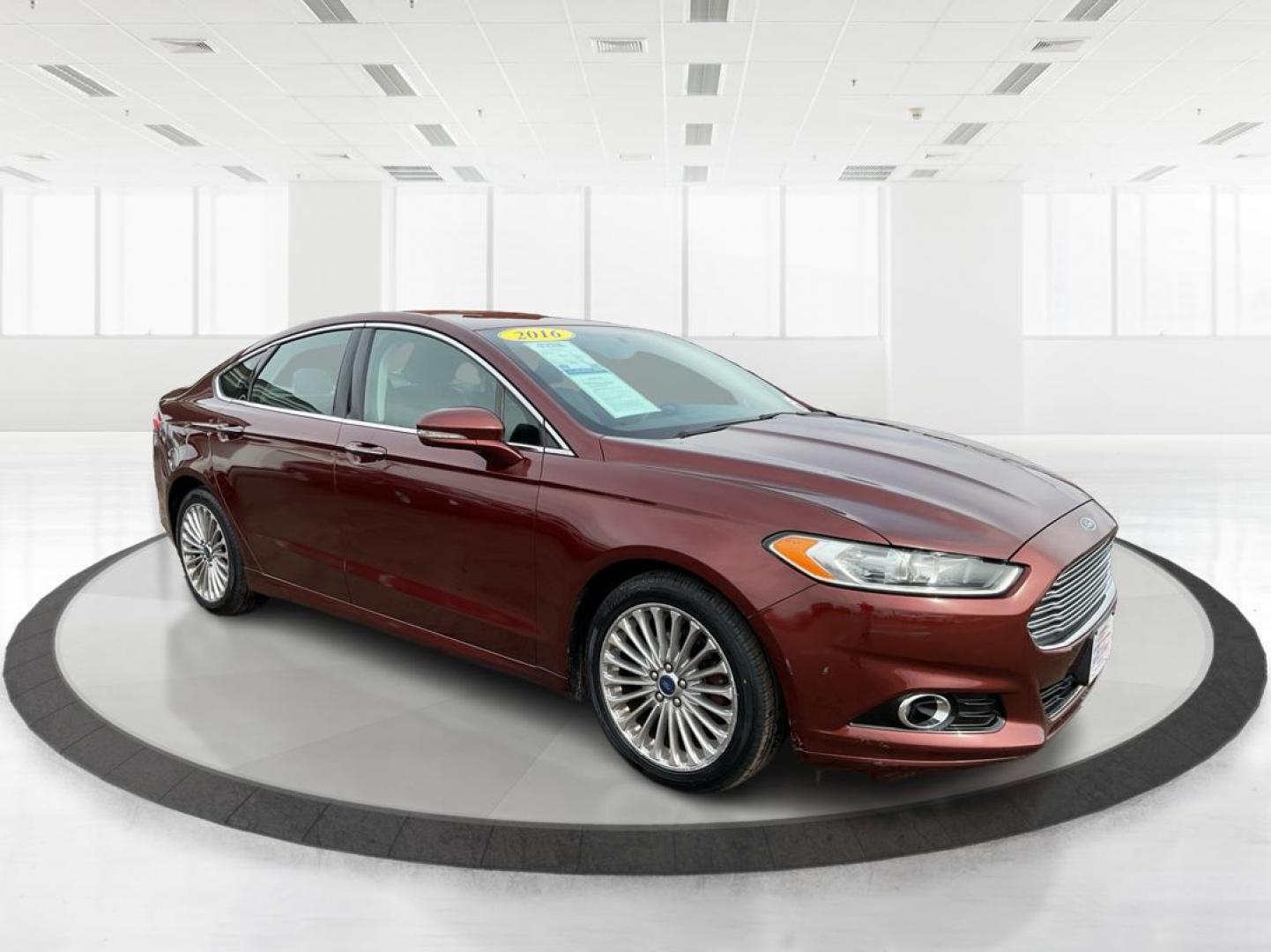 2016 Ford Fusion Titanium (3FA6P0K92GR) with an EcoBoost 2L I-4 gasoline direct injection engine, located at 1184 Kauffman Ave, Fairborn, OH, 45324, (937) 908-9800, 39.807072, -84.031563 - Photo#0