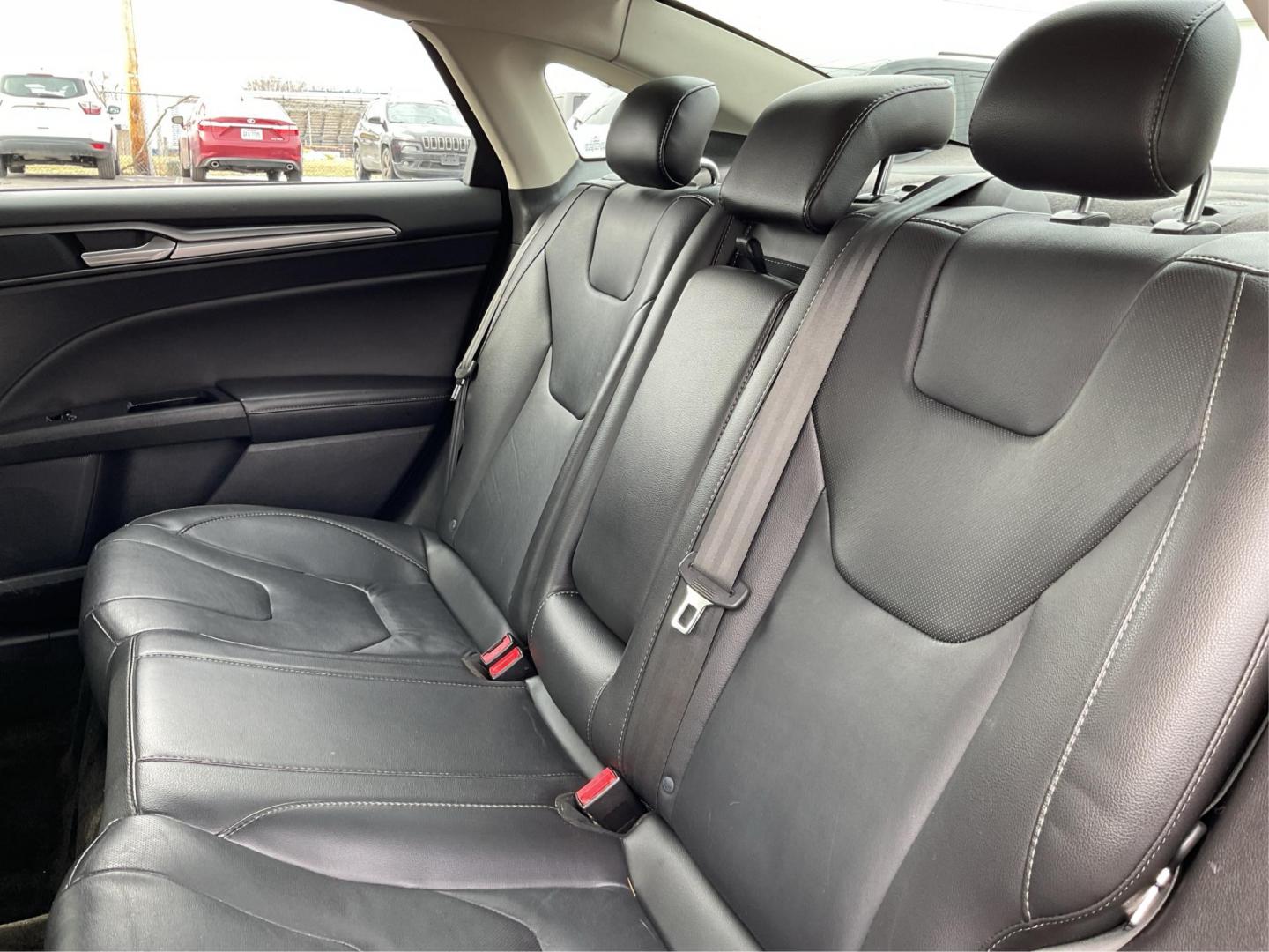 2016 Ford Fusion Titanium (3FA6P0K92GR) with an EcoBoost 2L I-4 gasoline direct injection engine, located at 1184 Kauffman Ave, Fairborn, OH, 45324, (937) 908-9800, 39.807072, -84.031563 - Photo#9