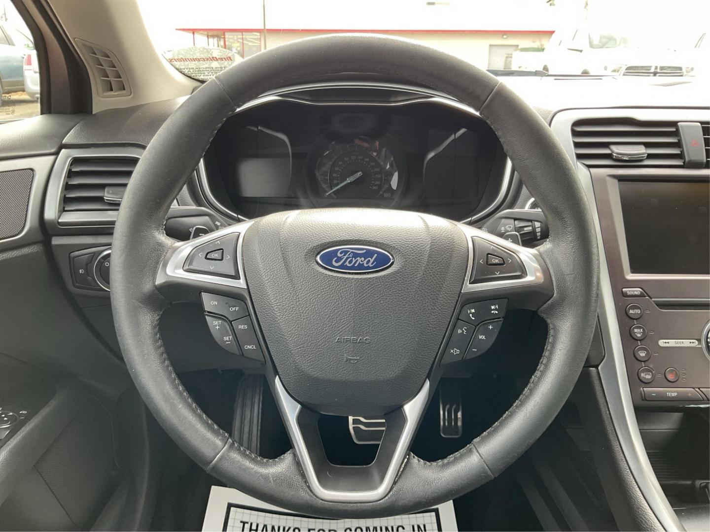 2016 Ford Fusion Titanium (3FA6P0K92GR) with an EcoBoost 2L I-4 gasoline direct injection engine, located at 1184 Kauffman Ave, Fairborn, OH, 45324, (937) 908-9800, 39.807072, -84.031563 - Photo#15