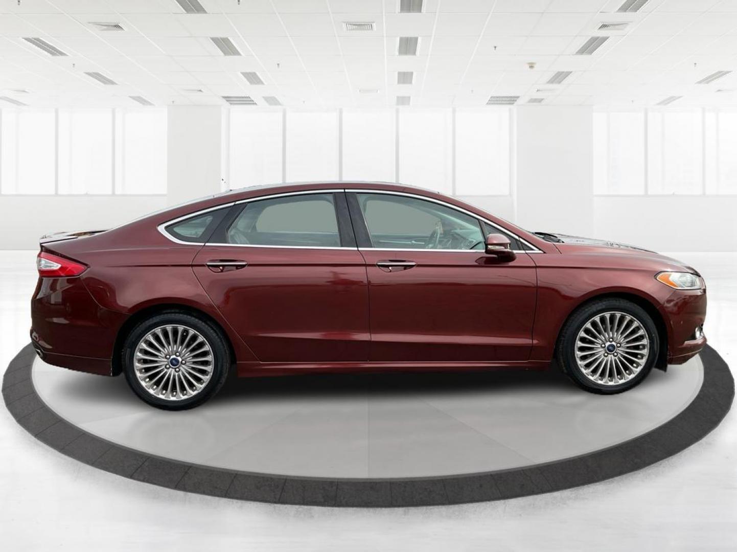 2016 Ford Fusion Titanium (3FA6P0K92GR) with an EcoBoost 2L I-4 gasoline direct injection engine, located at 1184 Kauffman Ave, Fairborn, OH, 45324, (937) 908-9800, 39.807072, -84.031563 - Photo#1