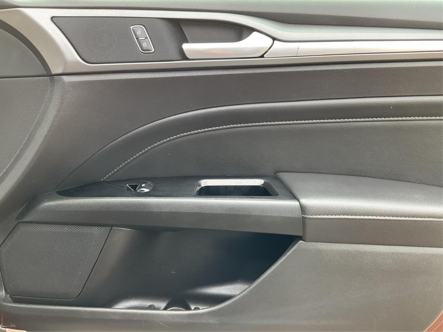 2016 Ford Fusion Titanium (3FA6P0K92GR) with an EcoBoost 2L I-4 gasoline direct injection engine, located at 1184 Kauffman Ave, Fairborn, OH, 45324, (937) 908-9800, 39.807072, -84.031563 - Photo#19