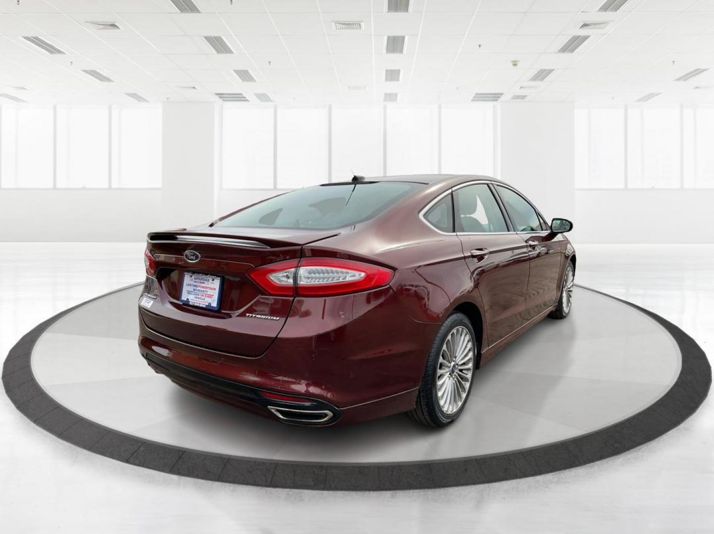 2016 Ford Fusion Titanium (3FA6P0K92GR) with an EcoBoost 2L I-4 gasoline direct injection engine, located at 1184 Kauffman Ave, Fairborn, OH, 45324, (937) 908-9800, 39.807072, -84.031563 - Photo#2