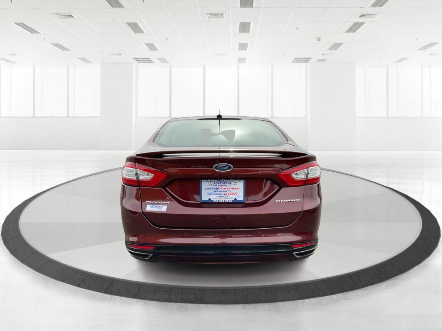 2016 Ford Fusion Titanium (3FA6P0K92GR) with an EcoBoost 2L I-4 gasoline direct injection engine, located at 1184 Kauffman Ave, Fairborn, OH, 45324, (937) 908-9800, 39.807072, -84.031563 - Photo#3