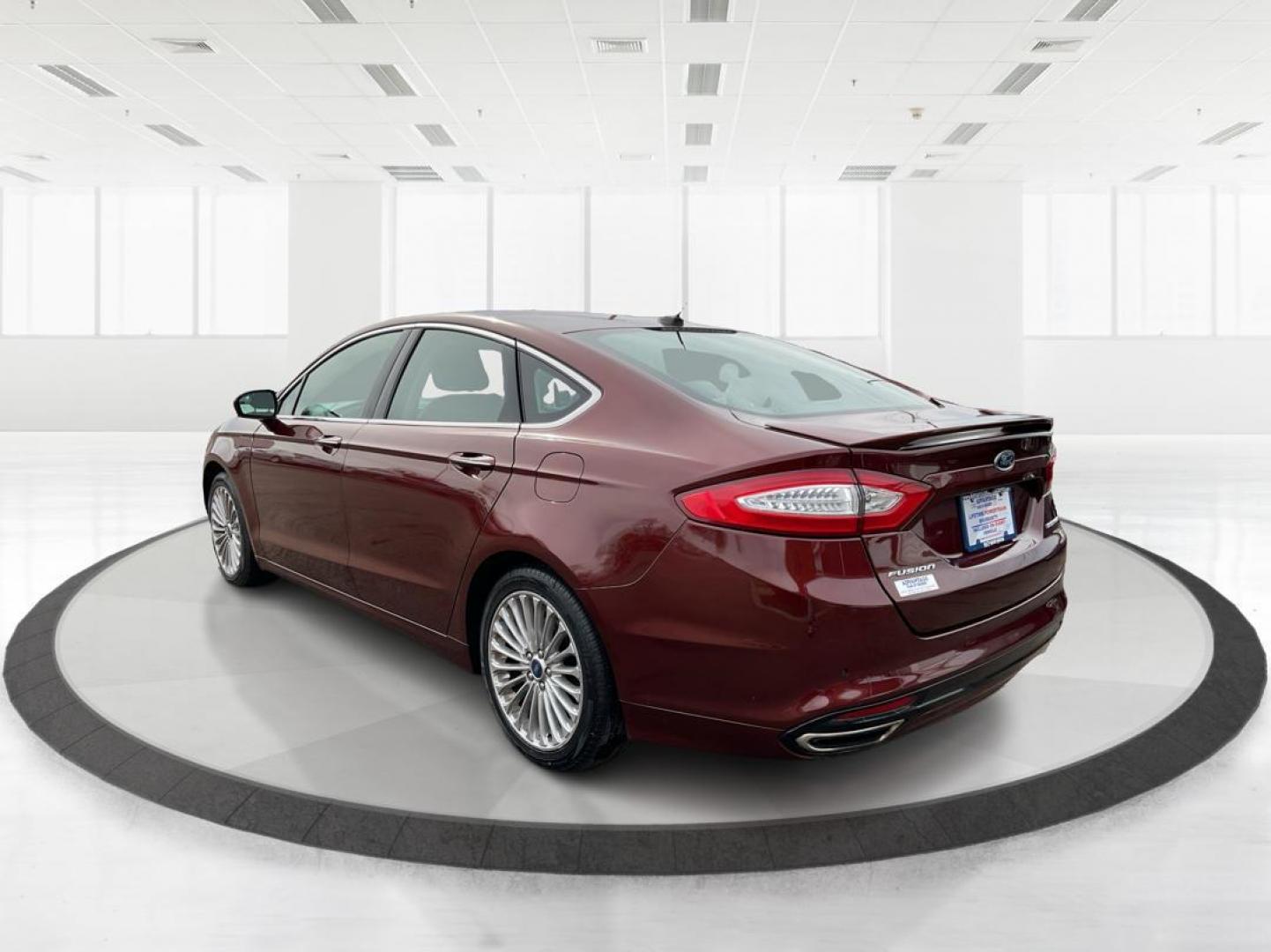 2016 Ford Fusion Titanium (3FA6P0K92GR) with an EcoBoost 2L I-4 gasoline direct injection engine, located at 1184 Kauffman Ave, Fairborn, OH, 45324, (937) 908-9800, 39.807072, -84.031563 - Photo#4