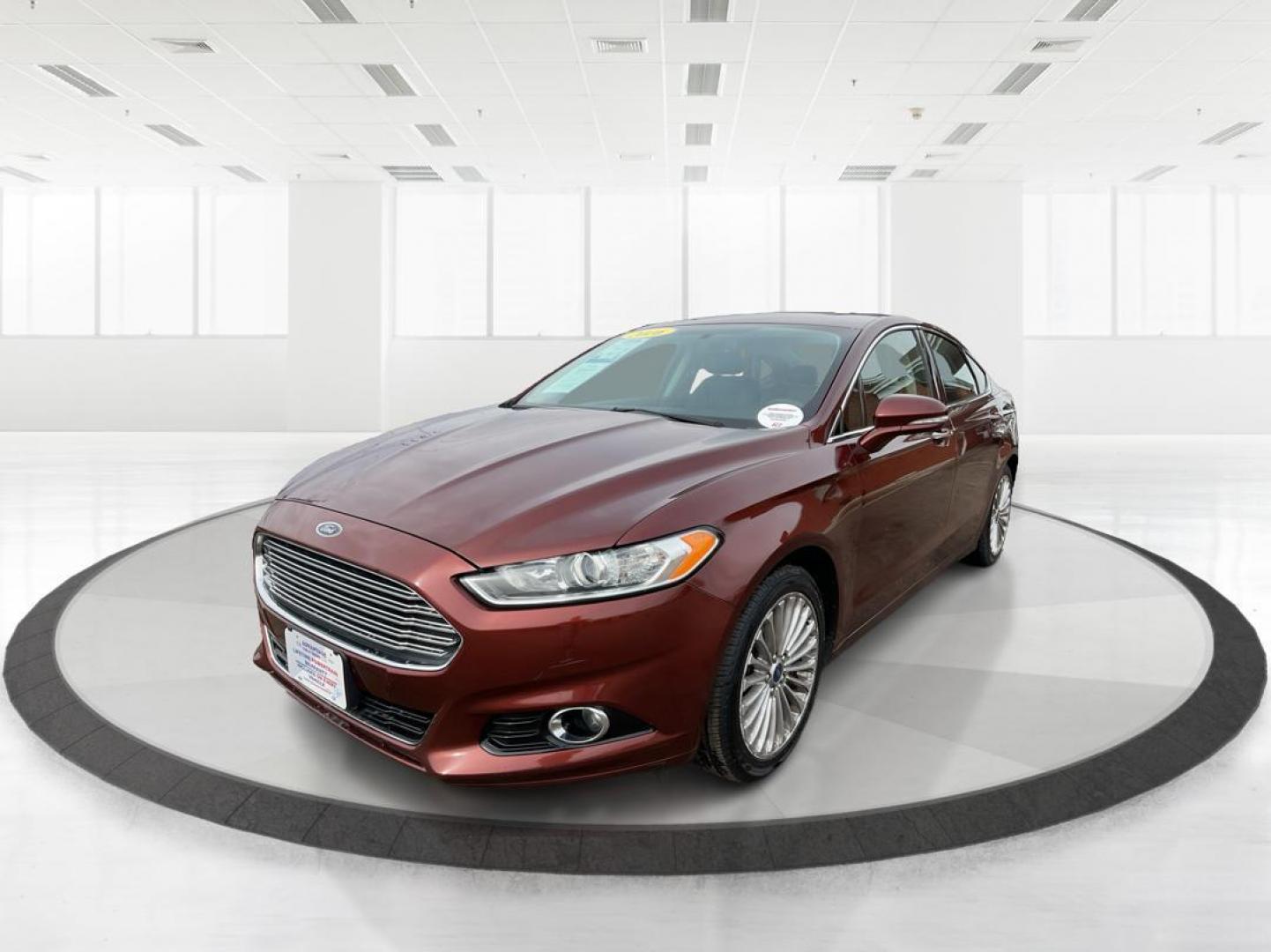 2016 Ford Fusion Titanium (3FA6P0K92GR) with an EcoBoost 2L I-4 gasoline direct injection engine, located at 1184 Kauffman Ave, Fairborn, OH, 45324, (937) 908-9800, 39.807072, -84.031563 - Photo#7