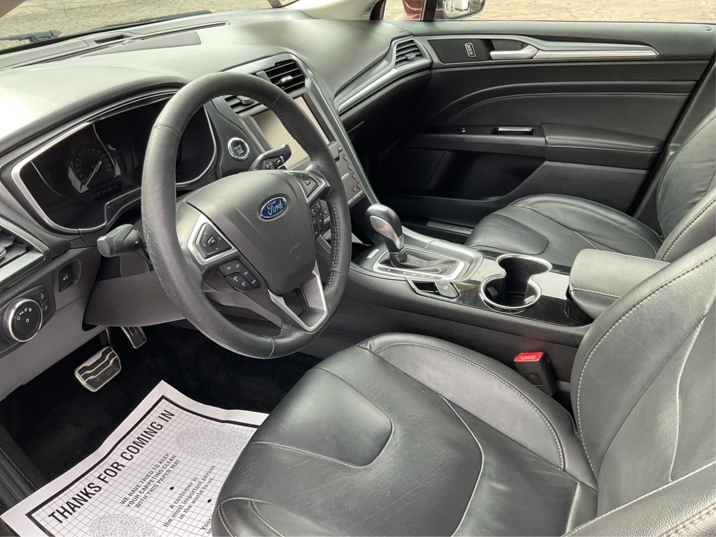2016 Ford Fusion Titanium (3FA6P0K92GR) with an EcoBoost 2L I-4 gasoline direct injection engine, located at 1184 Kauffman Ave, Fairborn, OH, 45324, (937) 908-9800, 39.807072, -84.031563 - Photo#8