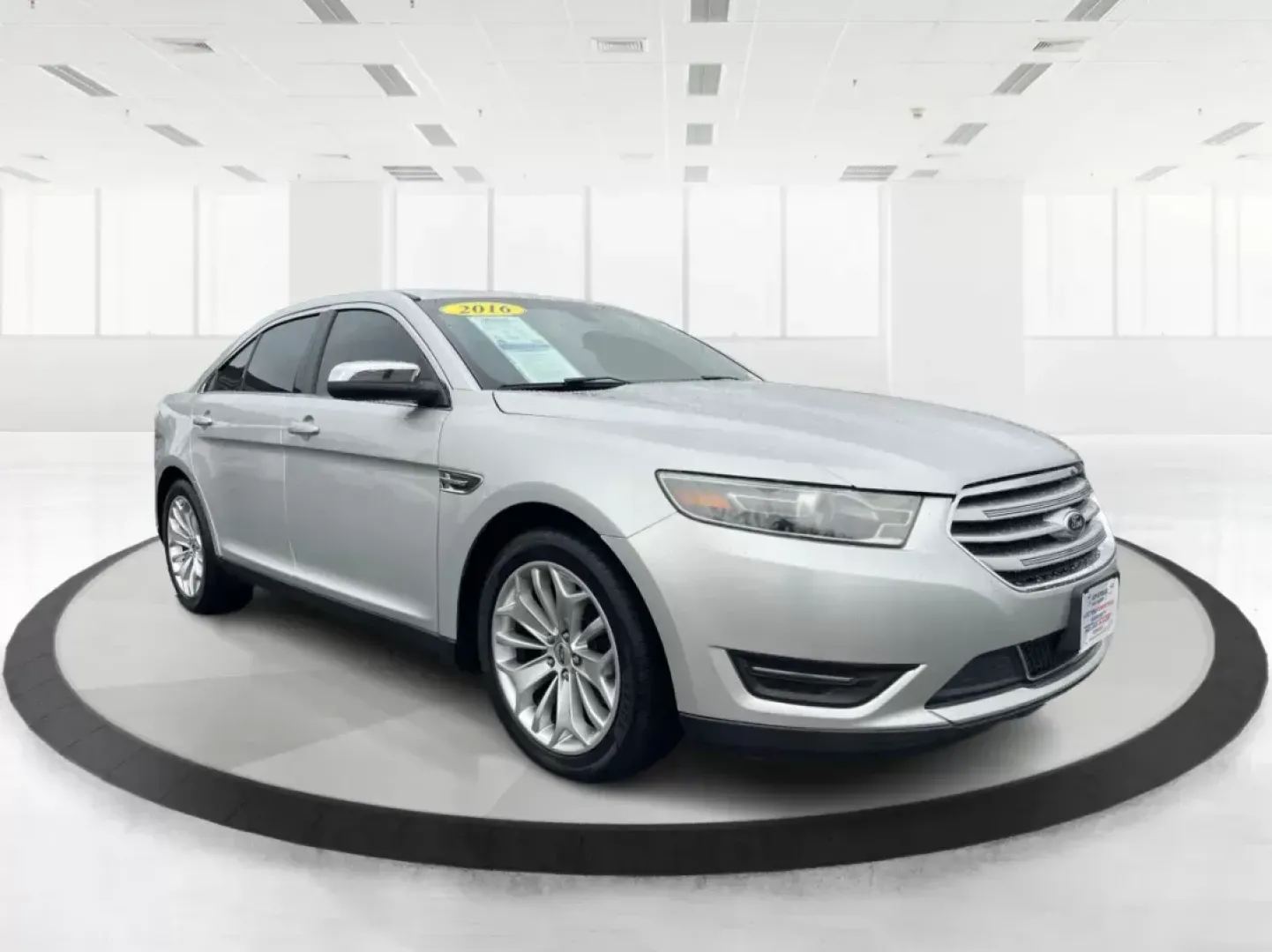 2016 Ford Taurus Limited (1FAHP2F82GG) with an EcoBoost 2L I-4 gasoline direct injection engine, located at 8750 N County Rd 25A, Piqua, OH, 45356, (937) 908-9800, 40.164391, -84.232513 - Photo#0