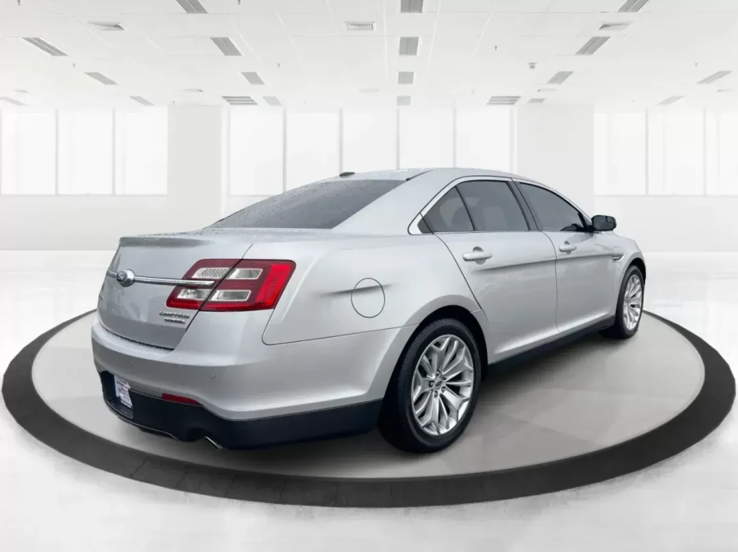 2016 Ford Taurus Limited (1FAHP2F82GG) with an EcoBoost 2L I-4 gasoline direct injection engine, located at 8750 N County Rd 25A, Piqua, OH, 45356, (937) 908-9800, 40.164391, -84.232513 - Photo#2