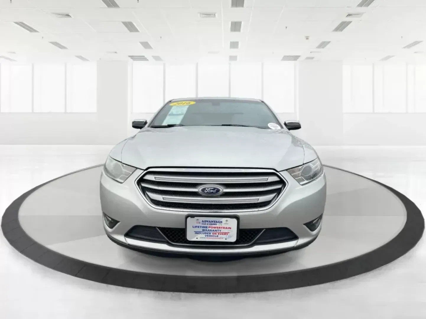 2016 Ford Taurus Limited (1FAHP2F82GG) with an EcoBoost 2L I-4 gasoline direct injection engine, located at 8750 N County Rd 25A, Piqua, OH, 45356, (937) 908-9800, 40.164391, -84.232513 - Photo#6