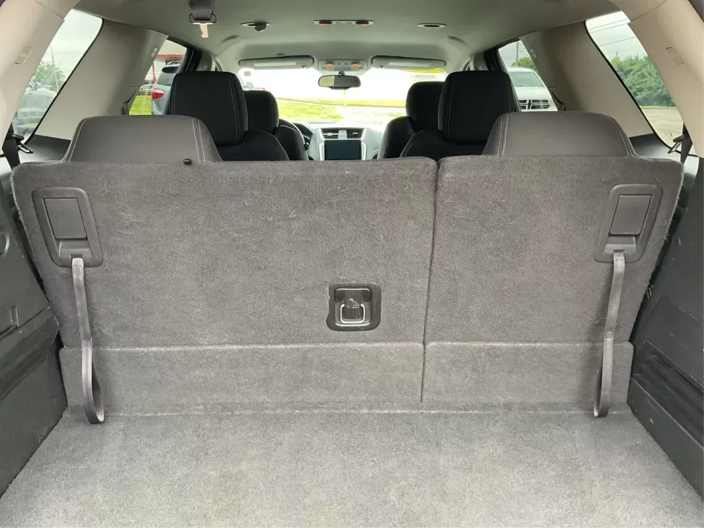 2016 GMC Acadia SLE-2 (1GKKRPKD7GJ) with an 3.6L V-6 gasoline direct injection engine, located at 8750 N County Rd 25A, Piqua, OH, 45356, (937) 908-9800, 40.164391, -84.232513 - Photo#11