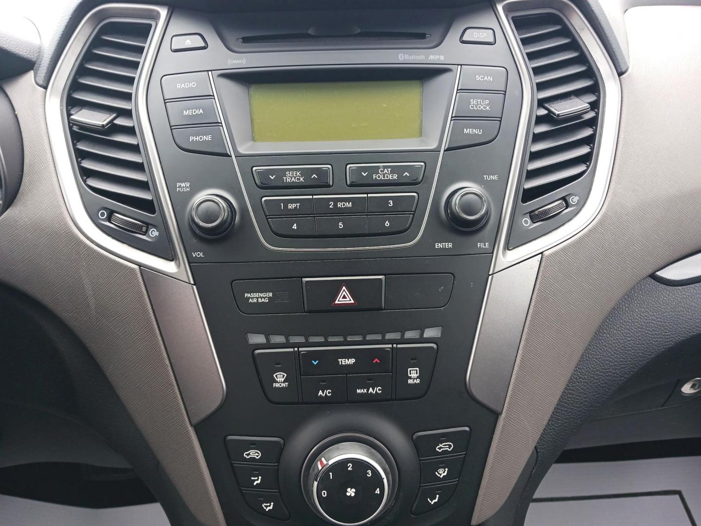 2016 Hyundai Santa Fe Sport 2.4 FWD (5XYZT3LB2GG) with an 2.4L L4 DOHC 16V engine, 6-Speed Automatic transmission, located at 1184 Kauffman Ave, Fairborn, OH, 45324, (937) 908-9800, 39.807072, -84.031563 - Photo#12