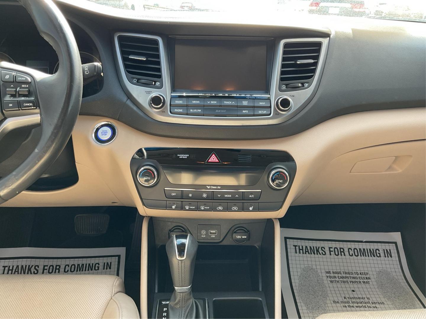 2016 Hyundai Tucson Limited (KM8J3CA20GU) with an 1.6L I-4 gasoline direct injection engine, located at 1099 N County Rd 25A , Troy, OH, 45373, (937) 908-9800, 40.057041, -84.215462 - Photo#12