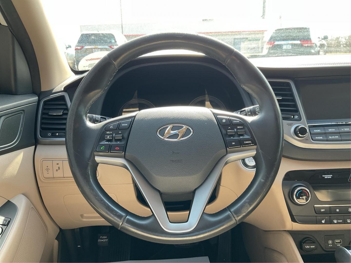 2016 Hyundai Tucson Limited (KM8J3CA20GU) with an 1.6L I-4 gasoline direct injection engine, located at 1099 N County Rd 25A , Troy, OH, 45373, (937) 908-9800, 40.057041, -84.215462 - Photo#15