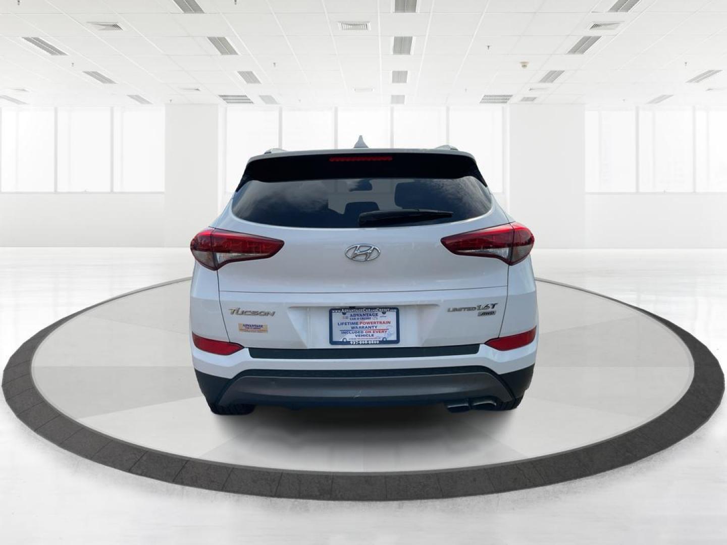 2016 Hyundai Tucson Limited (KM8J3CA20GU) with an 1.6L I-4 gasoline direct injection engine, located at 1099 N County Rd 25A , Troy, OH, 45373, (937) 908-9800, 40.057041, -84.215462 - Photo#3