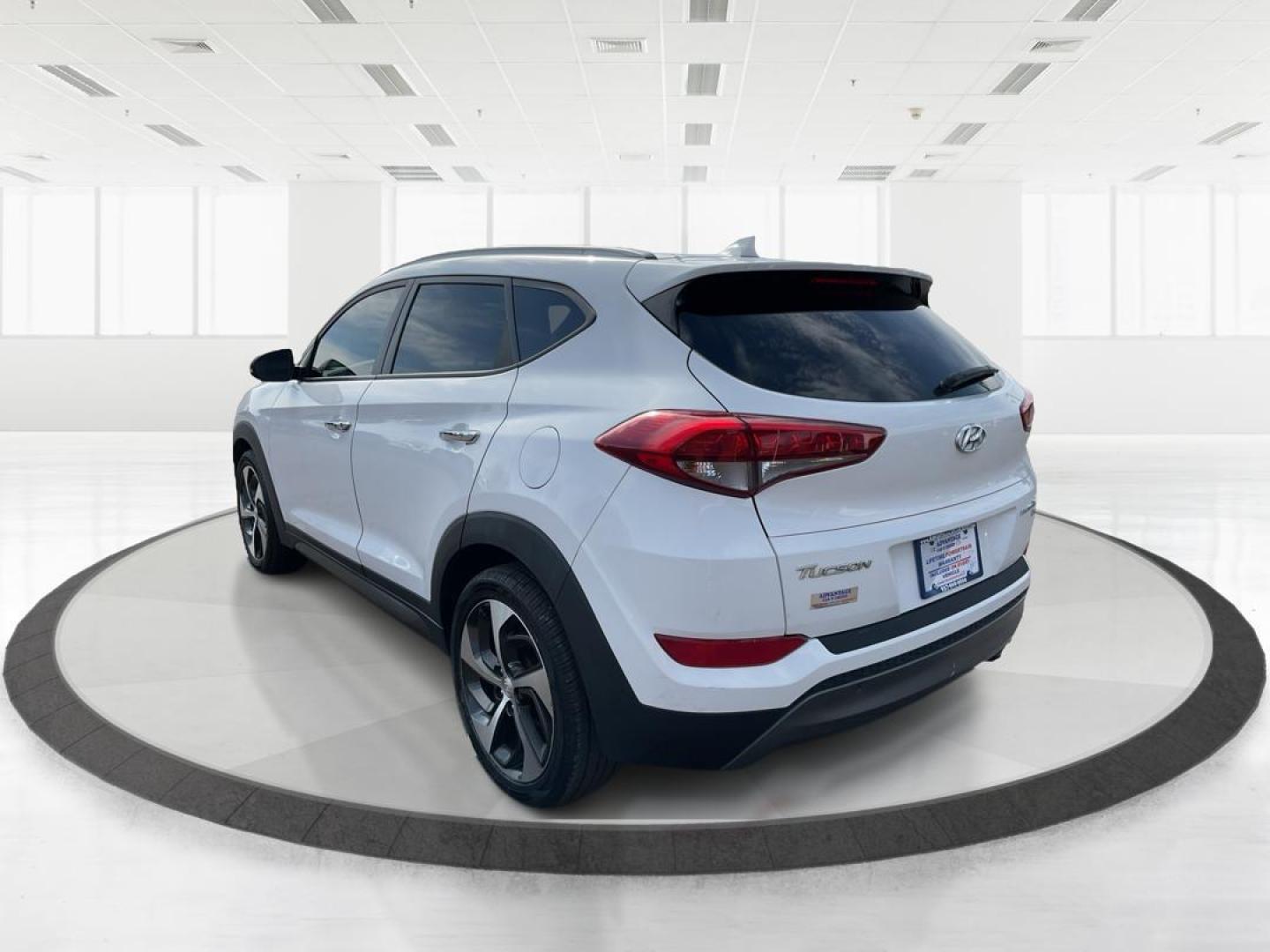 2016 Hyundai Tucson Limited (KM8J3CA20GU) with an 1.6L I-4 gasoline direct injection engine, located at 1099 N County Rd 25A , Troy, OH, 45373, (937) 908-9800, 40.057041, -84.215462 - Photo#4