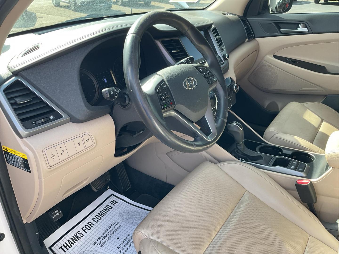 2016 Hyundai Tucson Limited (KM8J3CA20GU) with an 1.6L I-4 gasoline direct injection engine, located at 1099 N County Rd 25A , Troy, OH, 45373, (937) 908-9800, 40.057041, -84.215462 - Photo#8