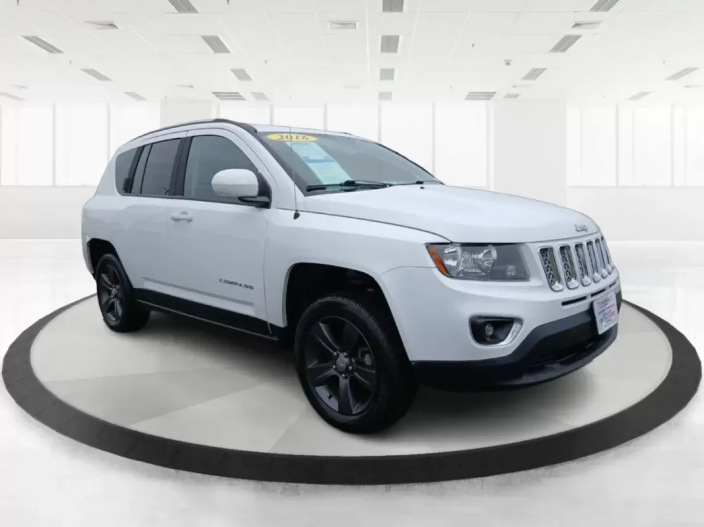 2016 Jeep Compass Latitude FWD (1C4NJCEA3GD) with an 2.0L L4 DOHC 16V engine, Continuously Variable Transmission transmission, located at 1951 S Dayton Lakeview Rd., New Carlisle, OH, 45344, (937) 908-9800, 39.890999, -84.050255 - Photo#0