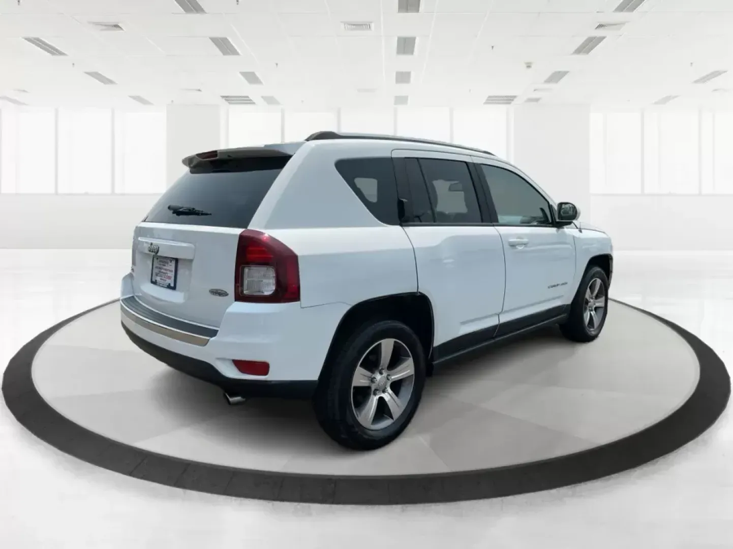 2016 Jeep Compass High Altitude Edition (1C4NJDEB9GD) with an 2.4L I-4 DOHC engine, located at 880 E. National Road, OH, 45377, (937) 908-9800, 39.891918, -84.183975 - Photo#2