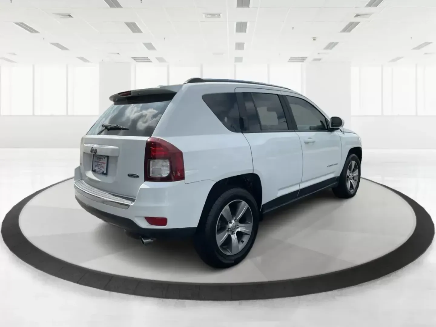 2016 Jeep Compass High Altitude Edition (1C4NJDEB6GD) with an 2.4L I-4 DOHC engine, located at 8750 N County Rd 25A, Piqua, OH, 45356, (937) 908-9800, 40.164391, -84.232513 - Photo#2