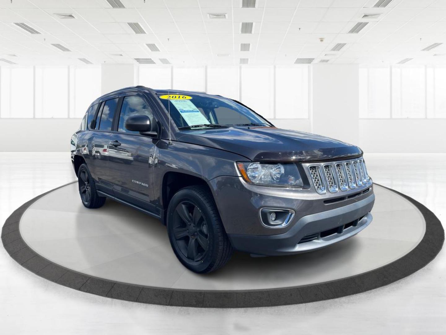 2016 Jeep Compass High Altitude Edition (1C4NJCEA4GD) with an 2L I-4 DOHC engine, located at 401 Woodman Dr, Riverside, OH, 45431, (937) 908-9800, 39.761024, -84.120956 - Photo#0