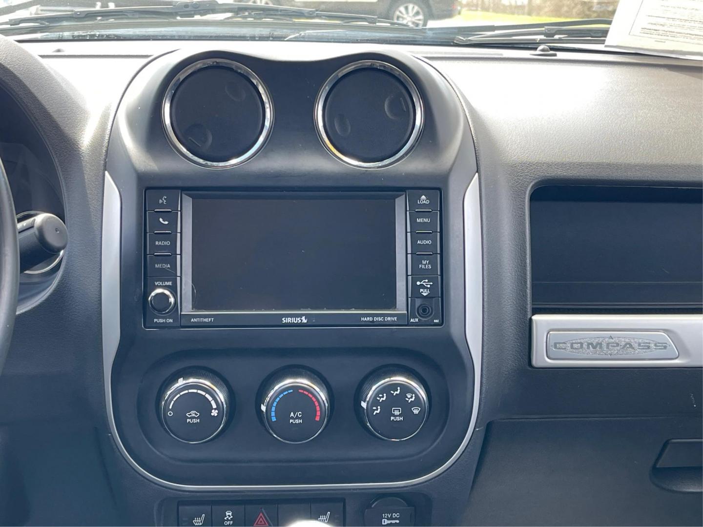 2016 Jeep Compass High Altitude Edition (1C4NJCEA4GD) with an 2L I-4 DOHC engine, located at 401 Woodman Dr, Riverside, OH, 45431, (937) 908-9800, 39.761024, -84.120956 - Photo#11