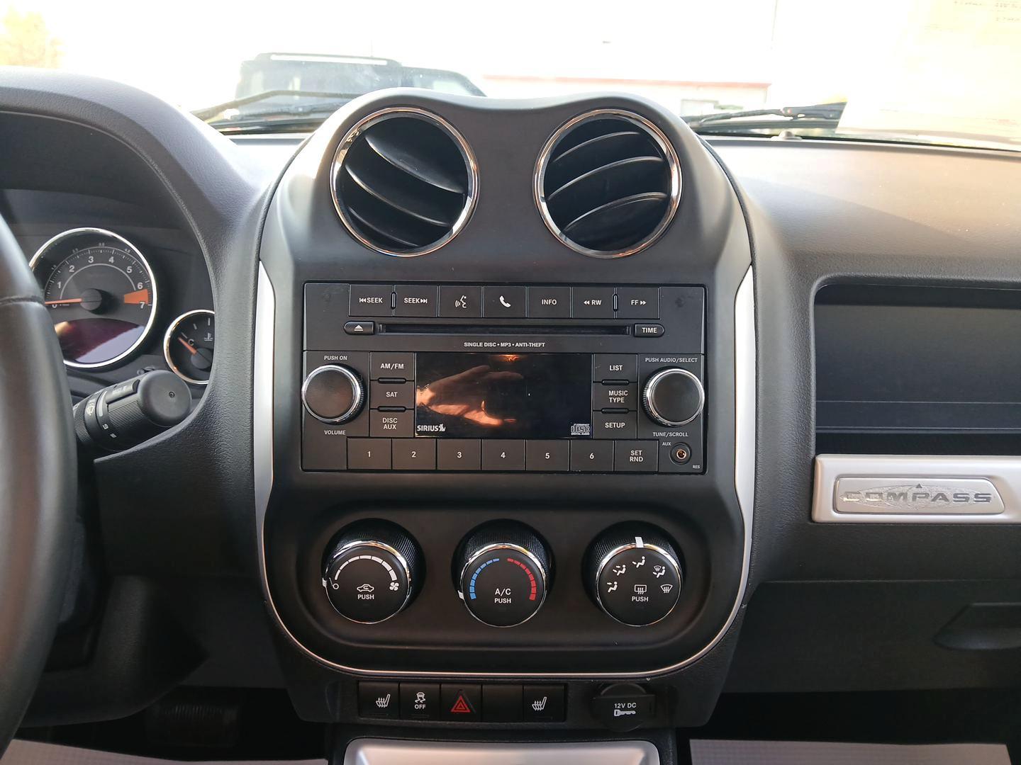 2016 Jeep Compass Latitude FWD (1C4NJCEB4GD) with an 2.4L L4 DOHC 16V engine, Continuously Variable Transmission transmission, located at 880 E. National Road, OH, 45377, (937) 908-9800, 39.891918, -84.183975 - Photo#12