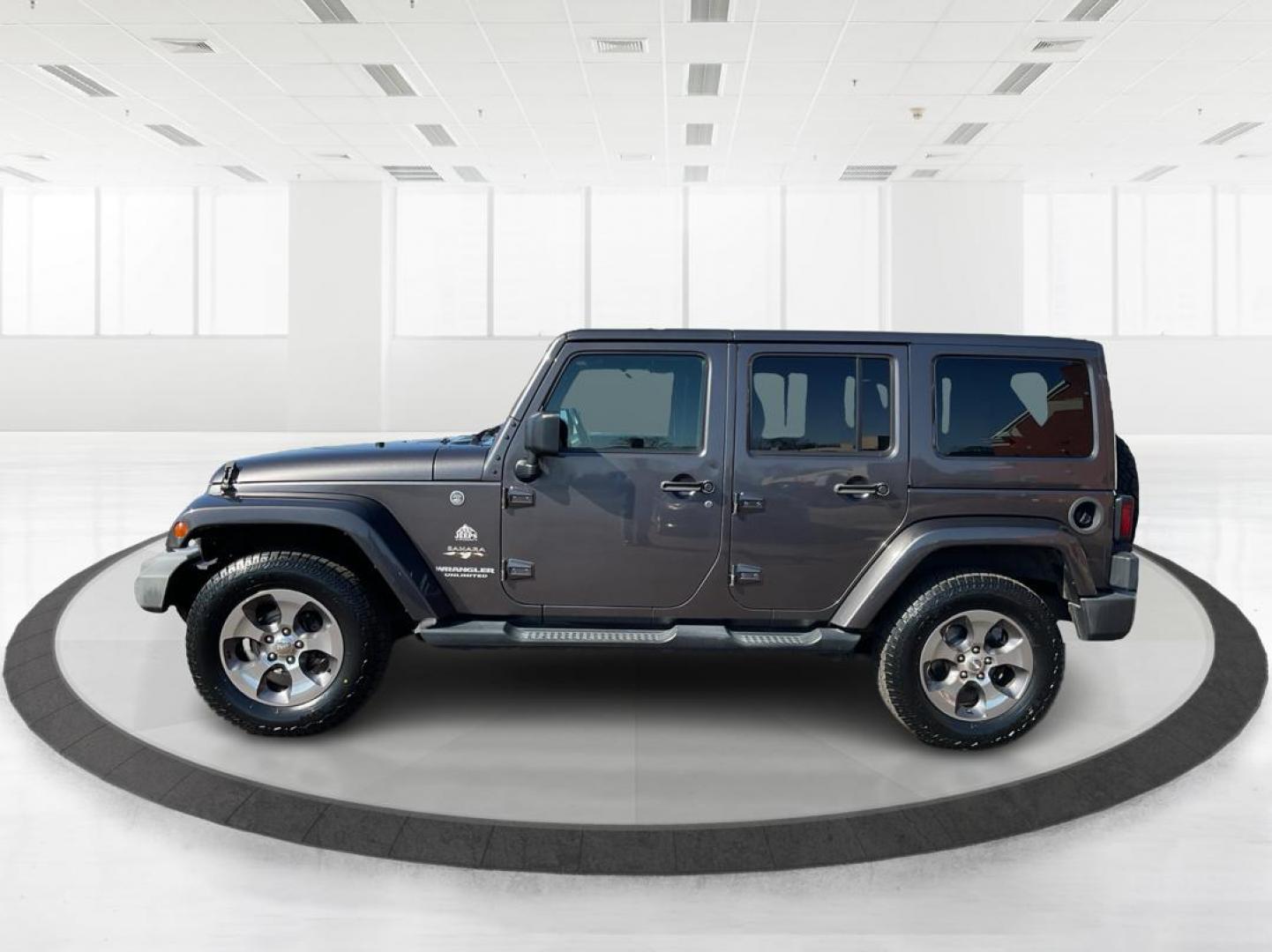 2016 Jeep Wrangler Unlimited Sahara 4WD (1C4BJWEG2GL) with an 3.6L V6 DOHC 24V FFV engine, located at 8750 N County Rd 25A, Piqua, OH, 45356, (937) 908-9800, 40.164391, -84.232513 - Photo#4