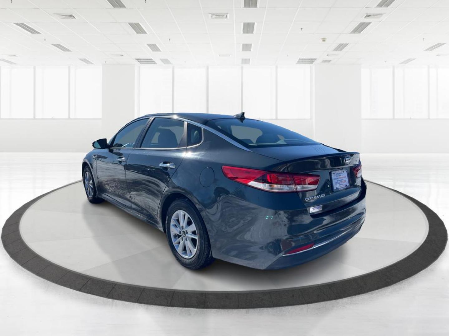 2016 Kia Optima LX (KNAGT4L3XG5) with an 2.4L L4 DOHC 16V engine, 6-Speed Automatic transmission, located at 1099 N County Rd 25A , Troy, OH, 45373, (937) 908-9800, 40.057041, -84.215462 - Photo#4