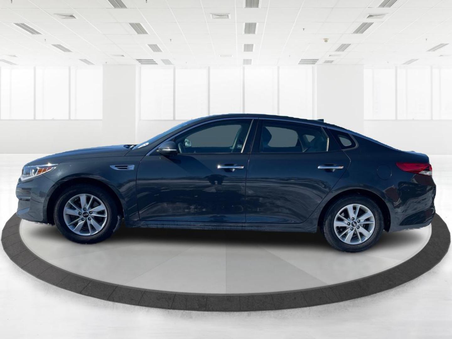2016 Kia Optima LX (KNAGT4L3XG5) with an 2.4L L4 DOHC 16V engine, 6-Speed Automatic transmission, located at 1099 N County Rd 25A , Troy, OH, 45373, (937) 908-9800, 40.057041, -84.215462 - Photo#5