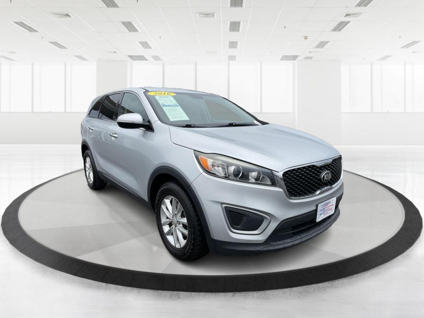 2016 Sparkling Silver Kia Sorento L 2WD (5XYPG4A31GG) with an 2.4L L4 DOHC 16V engine, 6-Speed Automatic transmission, located at 1184 Kauffman Ave, Fairborn, OH, 45324, (937) 908-9800, 39.807072, -84.031563 - Photo#0