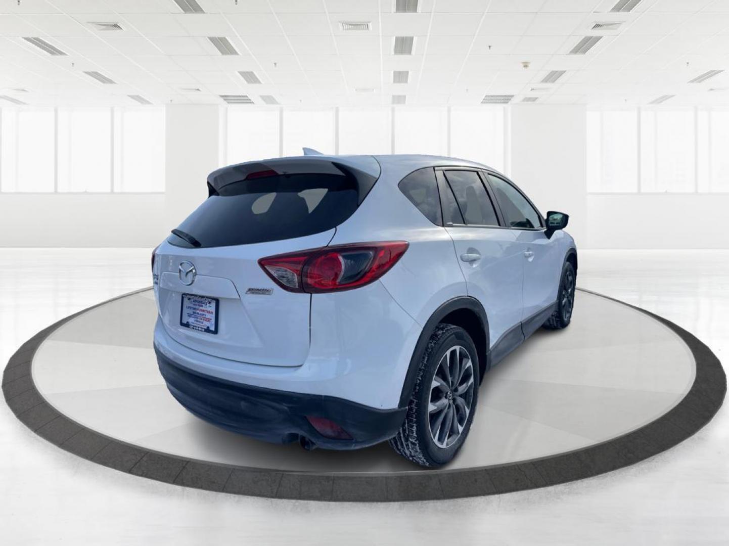 2016 Mazda CX-5 Grand Touring AWD (JM3KE4DY8G0) with an 2.5L L4 DOHC 16V engine, 6-Speed Automatic transmission, located at 1230 East Main St, Xenia, OH, 45385, (937) 908-9800, 39.688042, -83.910538 - Photo#2