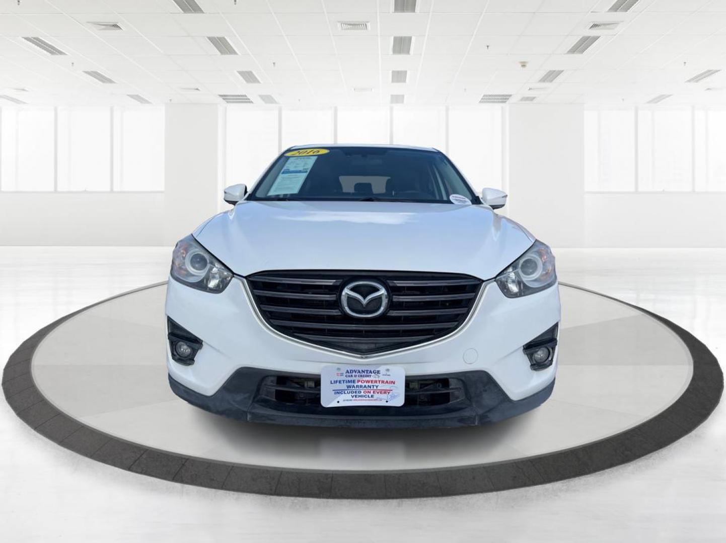 2016 Mazda CX-5 Grand Touring AWD (JM3KE4DY8G0) with an 2.5L L4 DOHC 16V engine, 6-Speed Automatic transmission, located at 1230 East Main St, Xenia, OH, 45385, (937) 908-9800, 39.688042, -83.910538 - Photo#6
