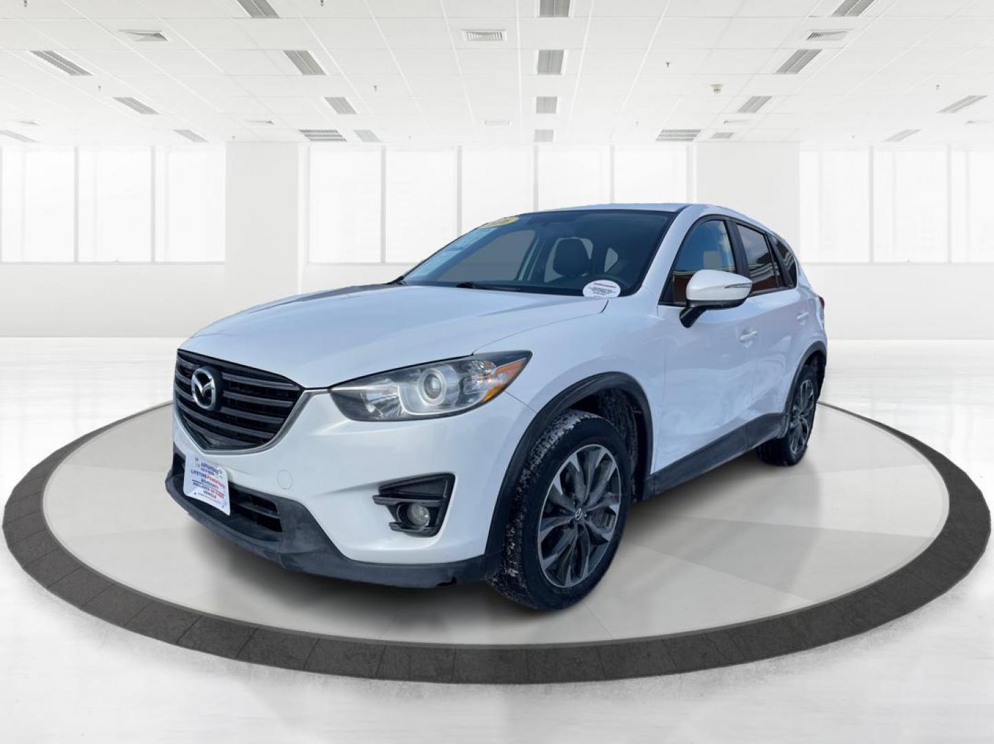 2016 Mazda CX-5 Grand Touring AWD (JM3KE4DY8G0) with an 2.5L L4 DOHC 16V engine, 6-Speed Automatic transmission, located at 1230 East Main St, Xenia, OH, 45385, (937) 908-9800, 39.688042, -83.910538 - Photo#7