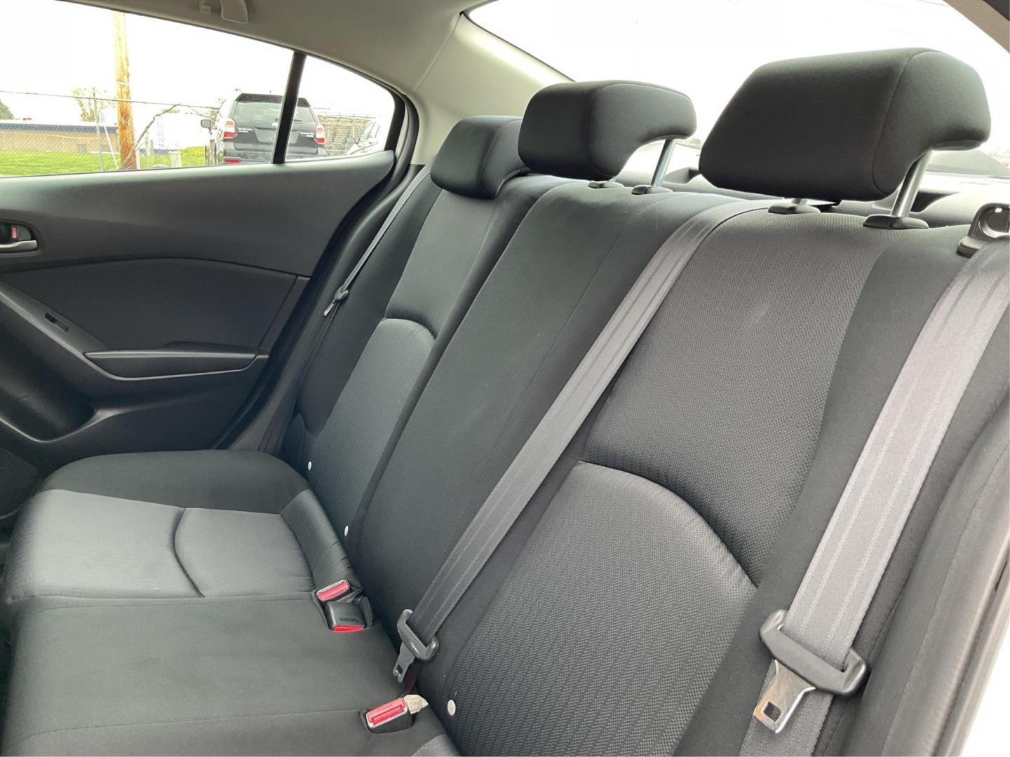 2016 Mazda Mazda3 i Sport (3MZBM1T74GM) with an SKYACTIV-G 2L I-4 gasoline direct injection engine, located at 880 E. National Road, OH, 45377, (937) 908-9800, 39.891918, -84.183975 - Photo#9