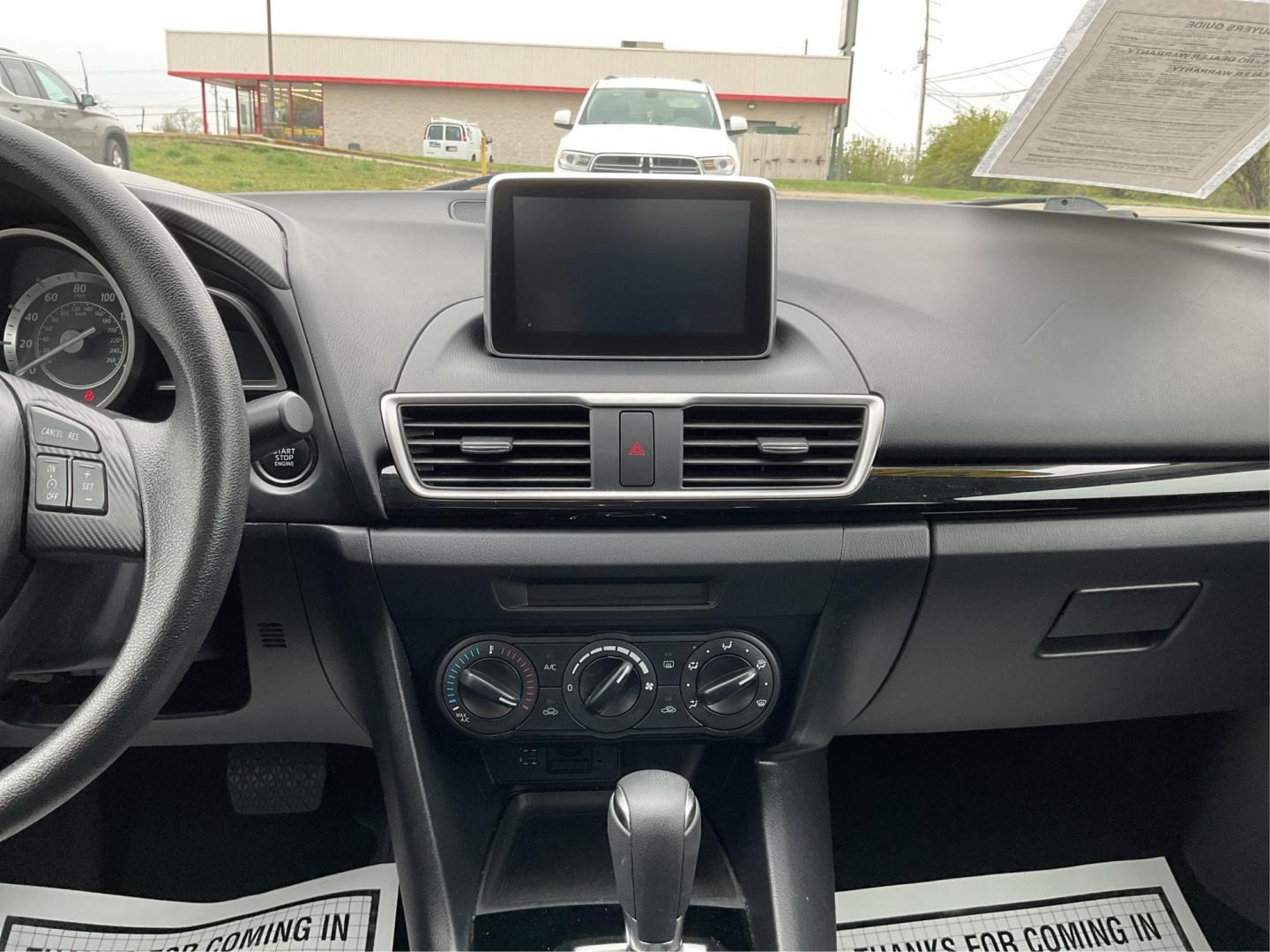 2016 Mazda Mazda3 i Sport (3MZBM1T74GM) with an SKYACTIV-G 2L I-4 gasoline direct injection engine, located at 880 E. National Road, OH, 45377, (937) 908-9800, 39.891918, -84.183975 - Photo#12