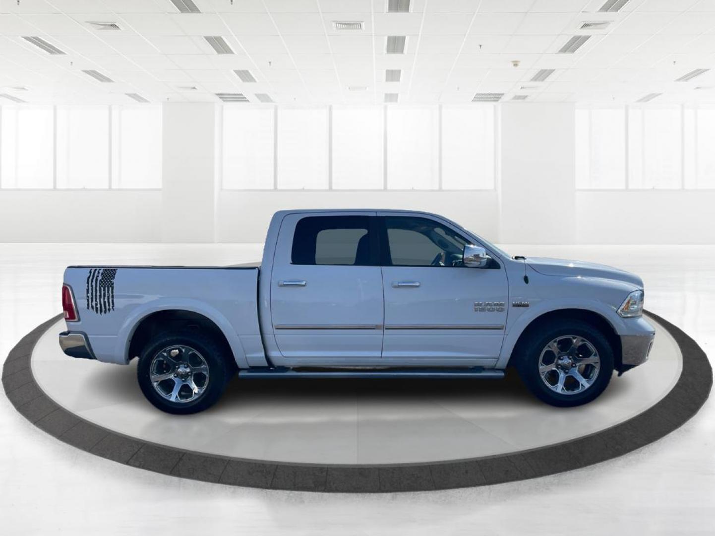 2016 Ram 1500 Laramie (1C6RR7NTXGS) with an Other engine, located at 1230 East Main St, Xenia, OH, 45385, (937) 908-9800, 39.688042, -83.910538 - Photo#1